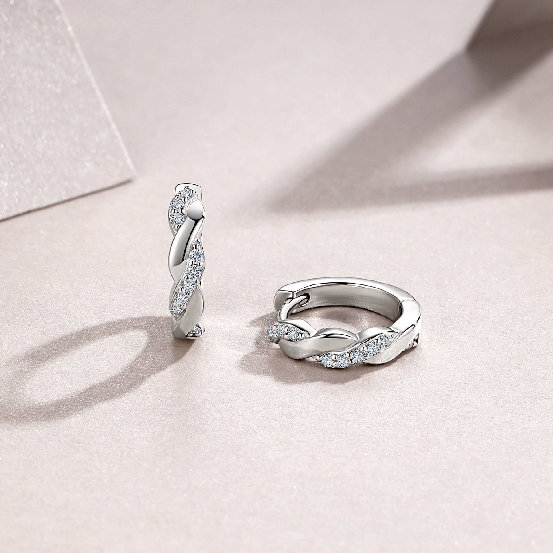 Torsade Moissanite Twisted Huggie Hoop Earrings in Sterling Silver