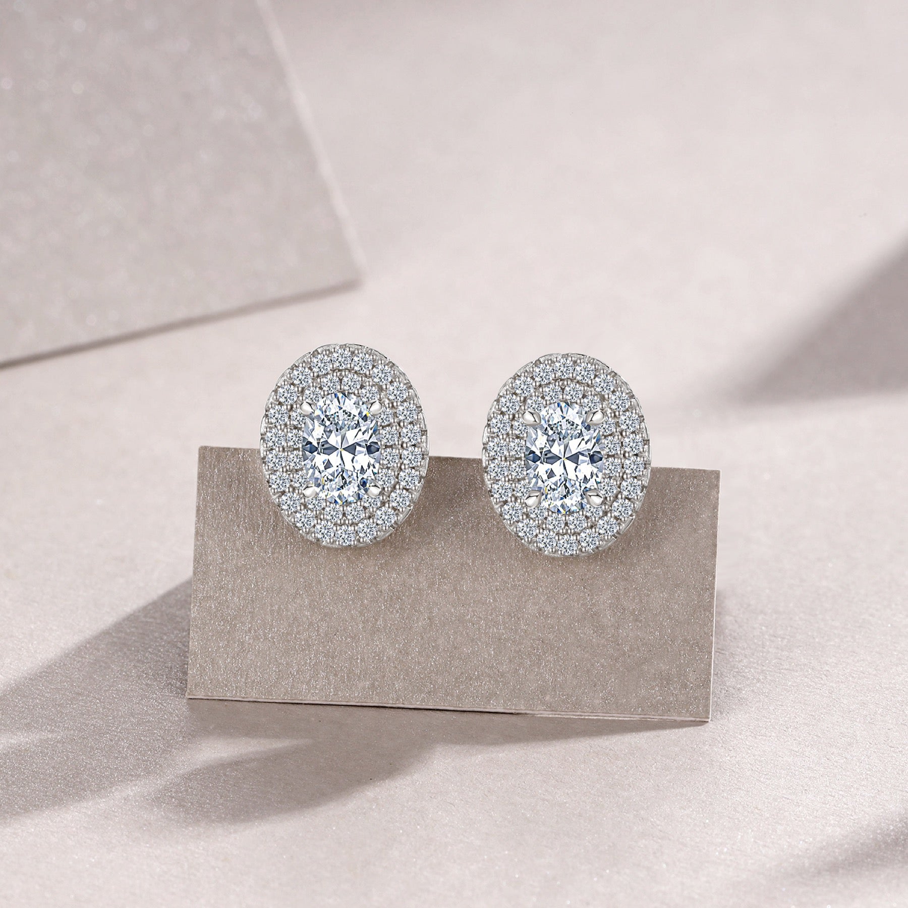 Olivia Moissanite Oval Halo Stud Earrings in Sterling Silver