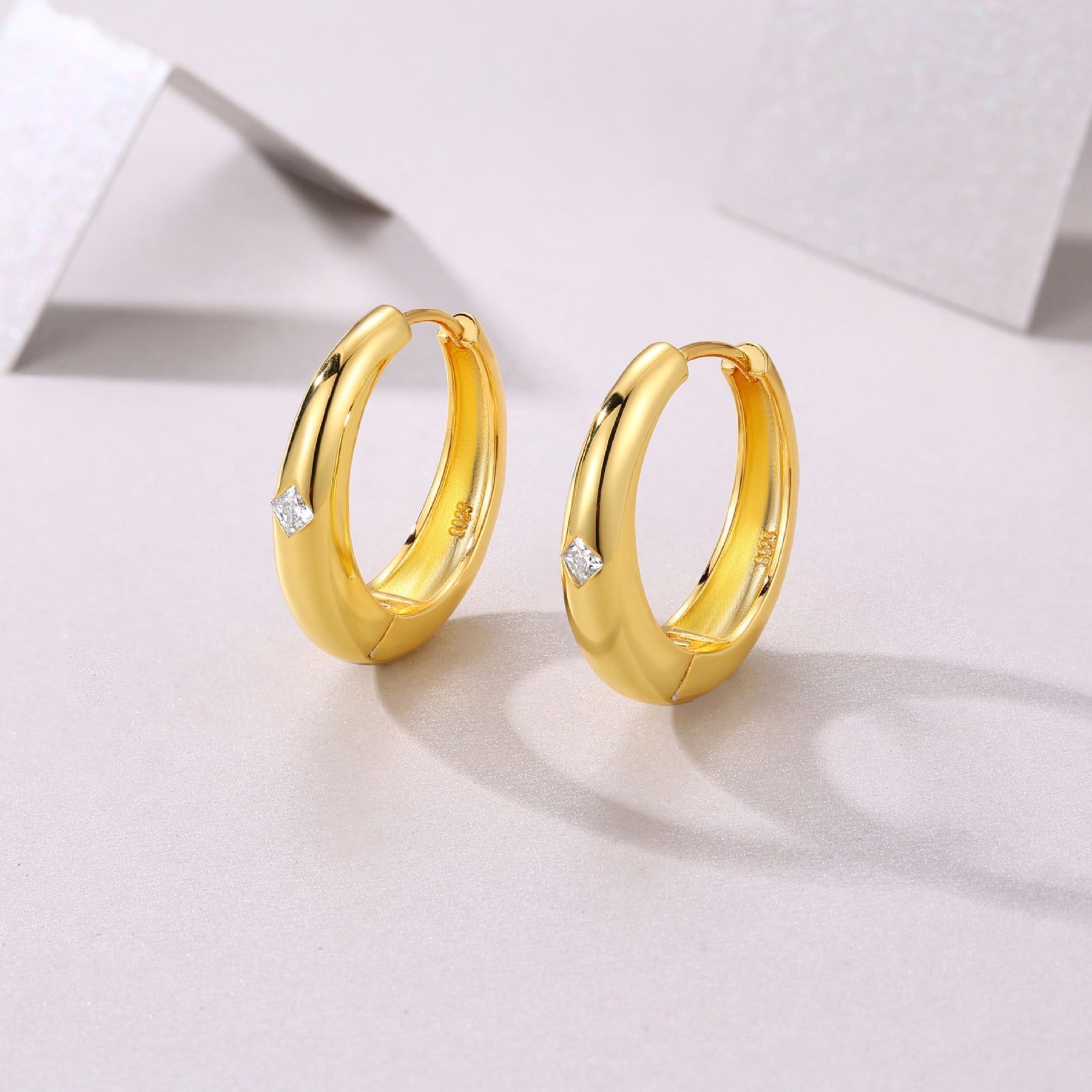 Stellare Moissanite Huggie Hoop Earrings in Gold-Tone Sterling Silver