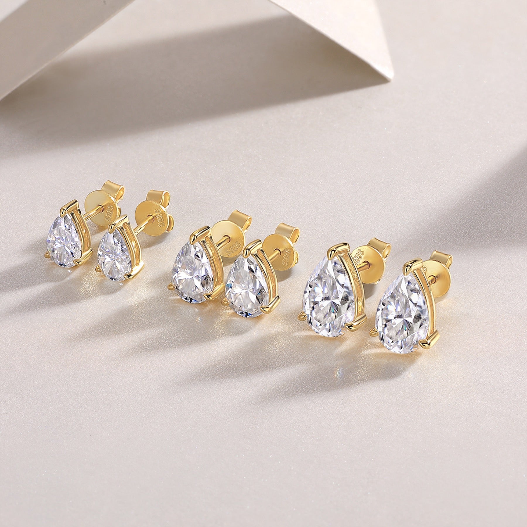 Foglia Moissanite Pear Stud Earrings in Gold-Tone Sterling Silver