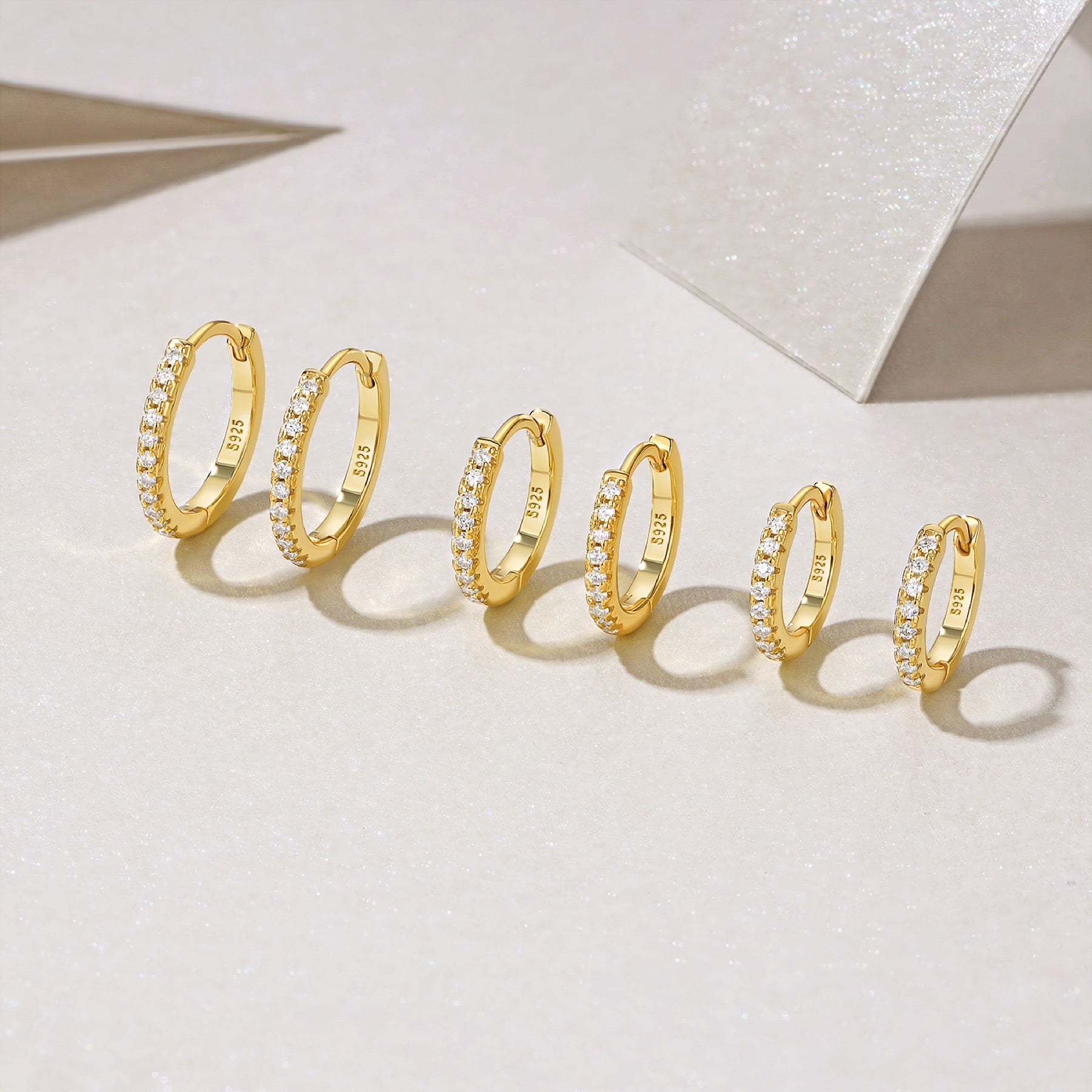 Cerchio Moissanite Huggie Hoop Earrings in Gold-Tone Sterling Silver