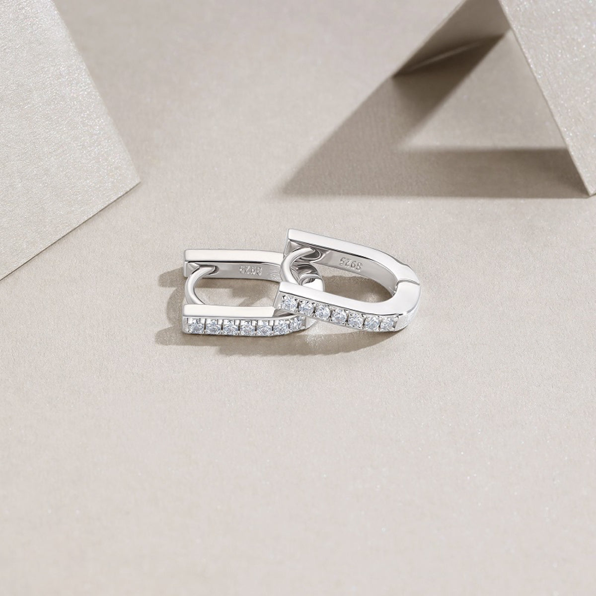 Arco Moissanite Huggie Hoop Earrings in Sterling Silver