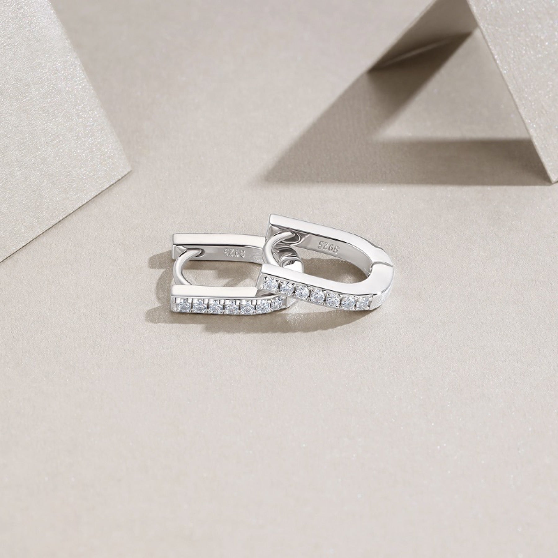Arco Moissanite Huggie Hoop Earrings in Sterling Silver