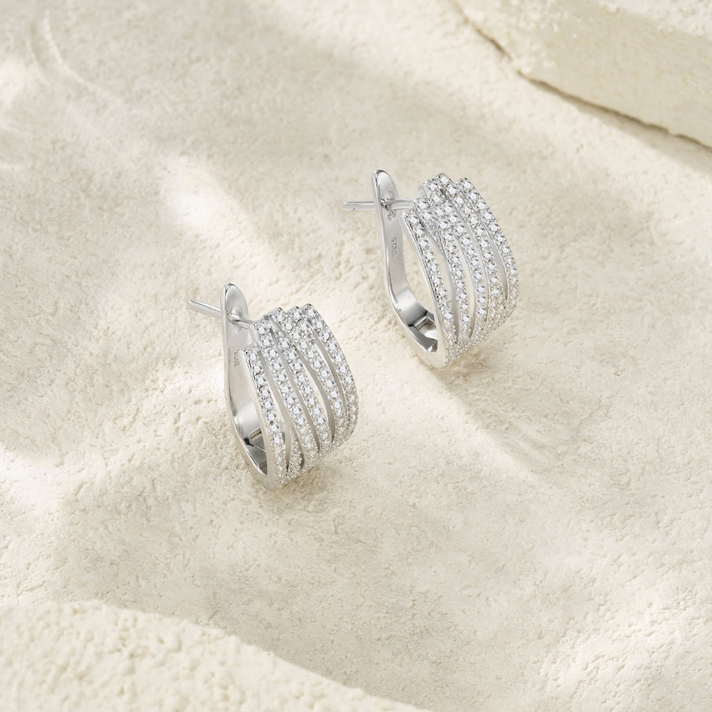Fascia Moissanite Huggie Hoop Earrings in Sterling Silver