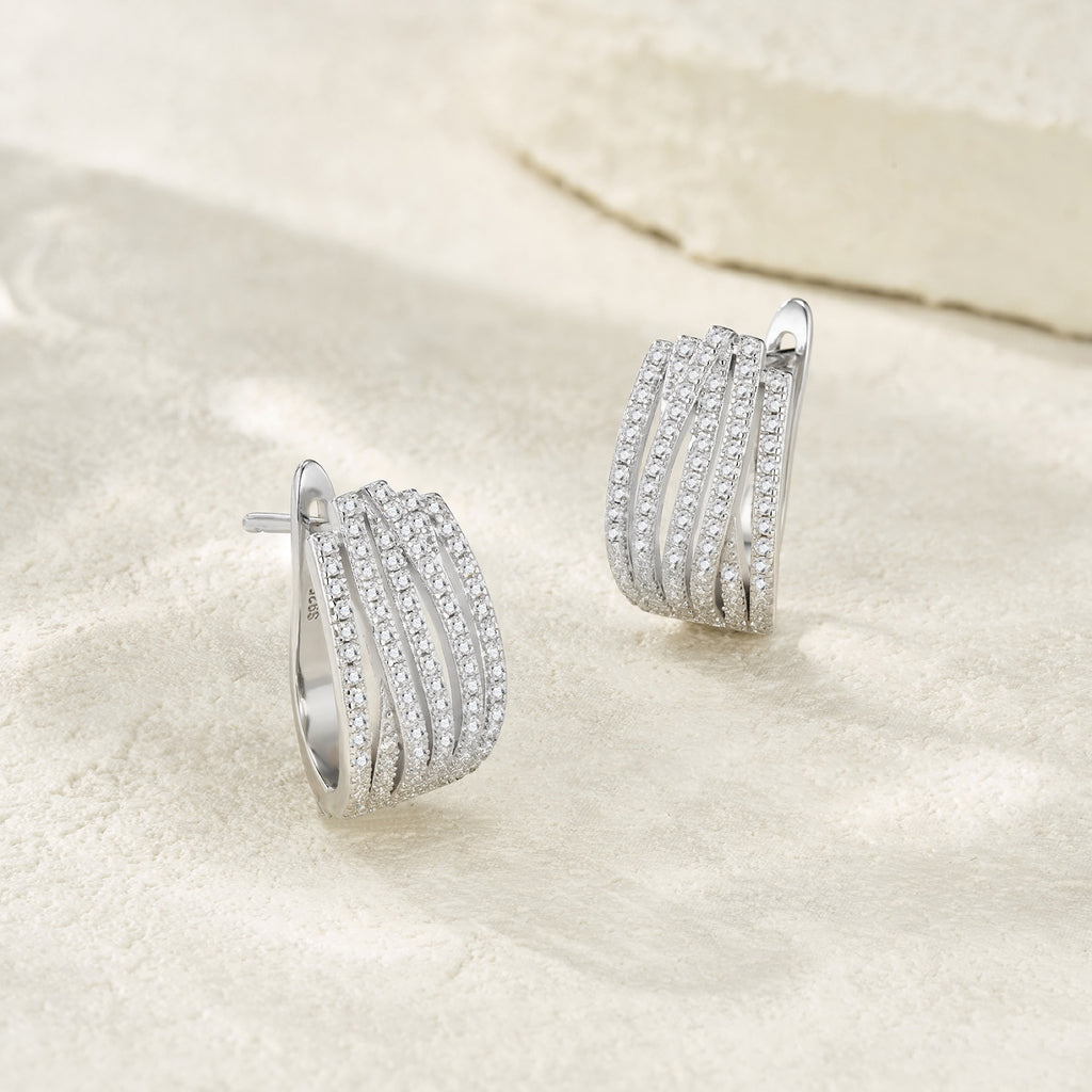 Fascia Moissanite Huggie Hoop Earrings in Sterling Silver