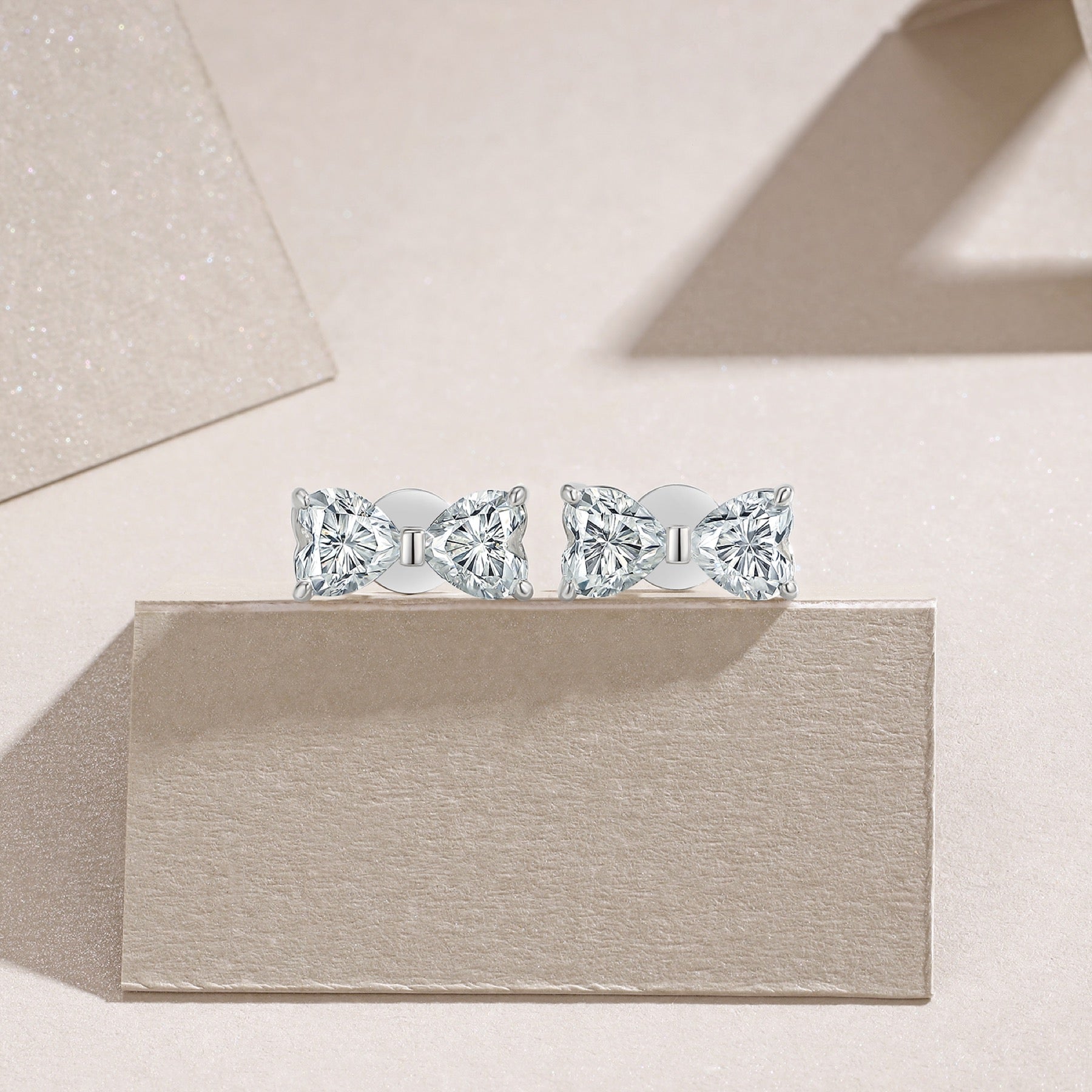 Fiocchetto Moissanite Bow Stud Earrings in Sterling Silver