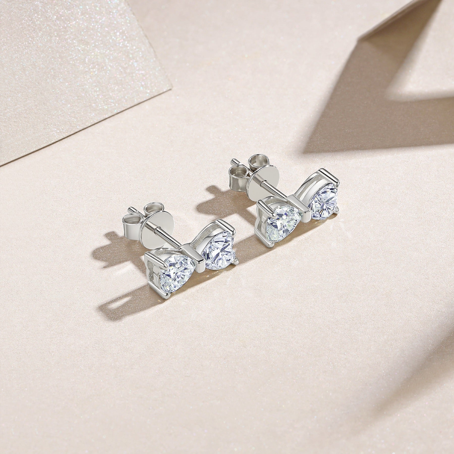 Fiocchetto Moissanite Bow Stud Earrings in Sterling Silver