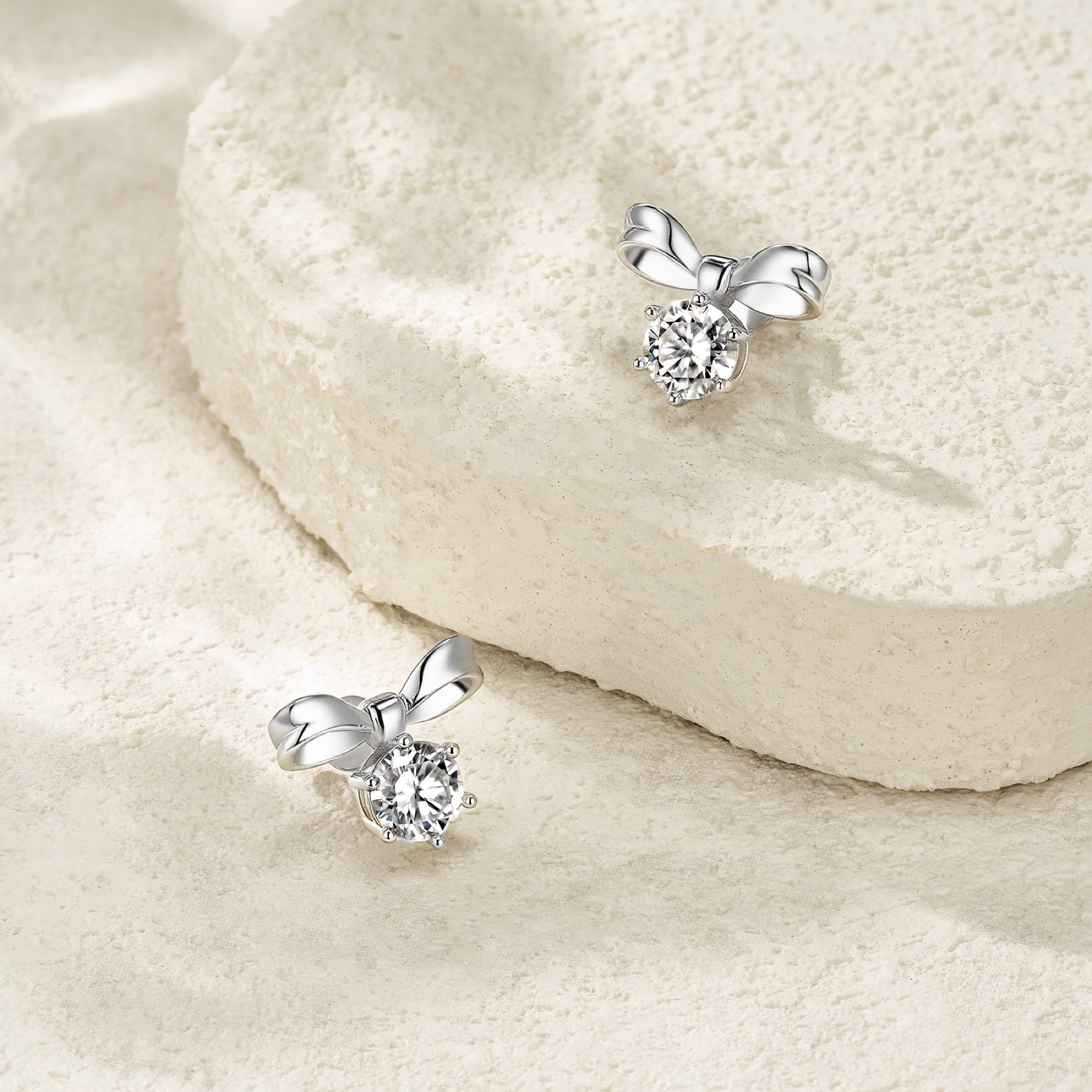 Nastro Moissanite Bow Stud Earrings in Sterling Silver