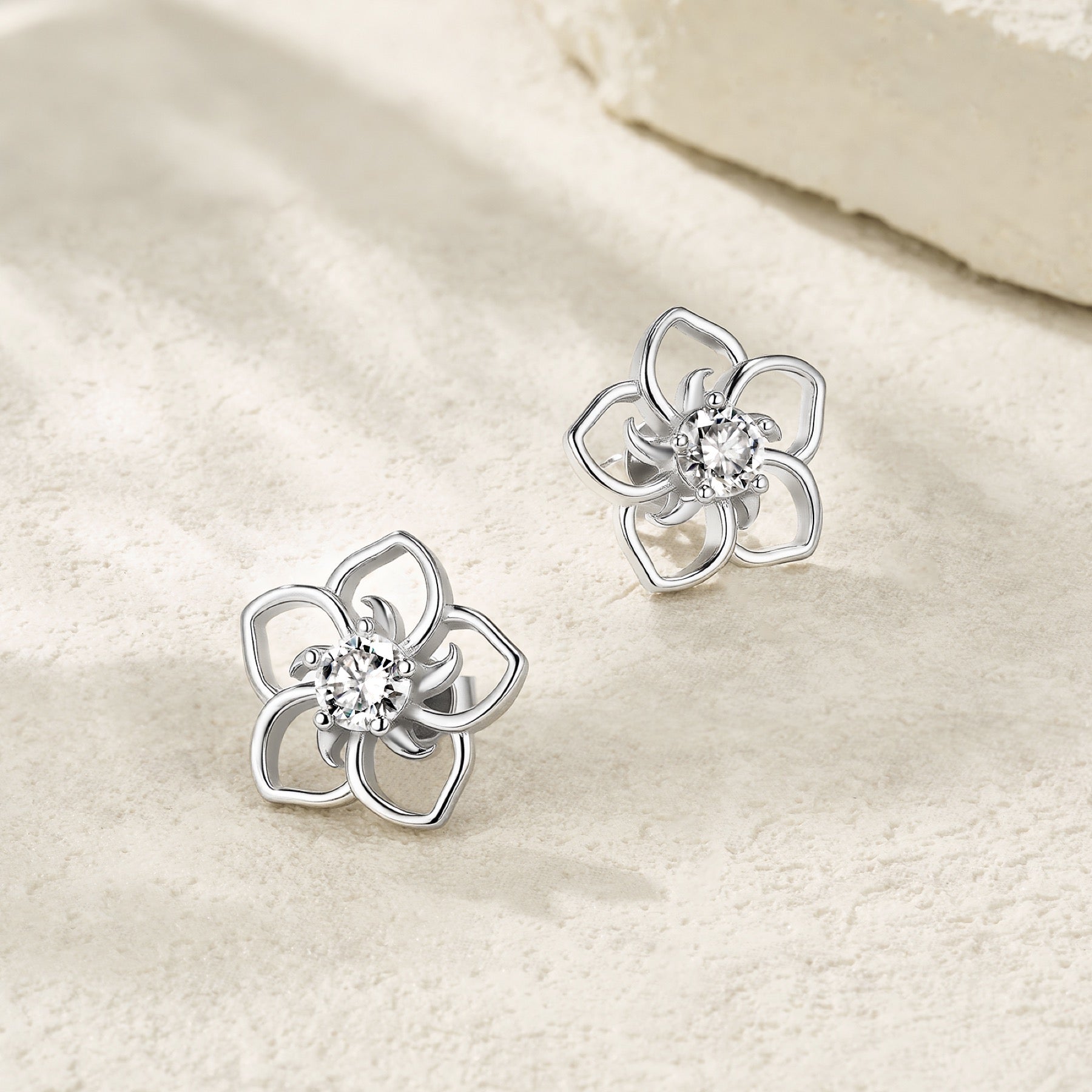 Plumeria Moissanite Flower Stud Earrings in Sterling Silver