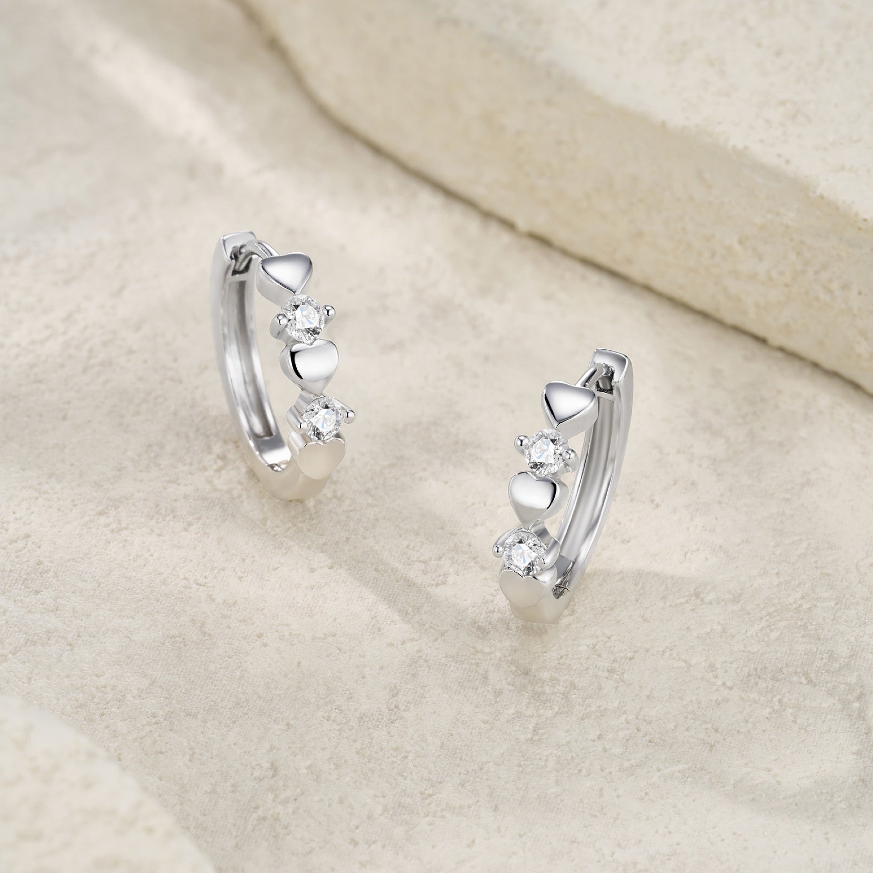 Cuoricini Moissanite Huggie Hoop Earrings in Sterling Silver