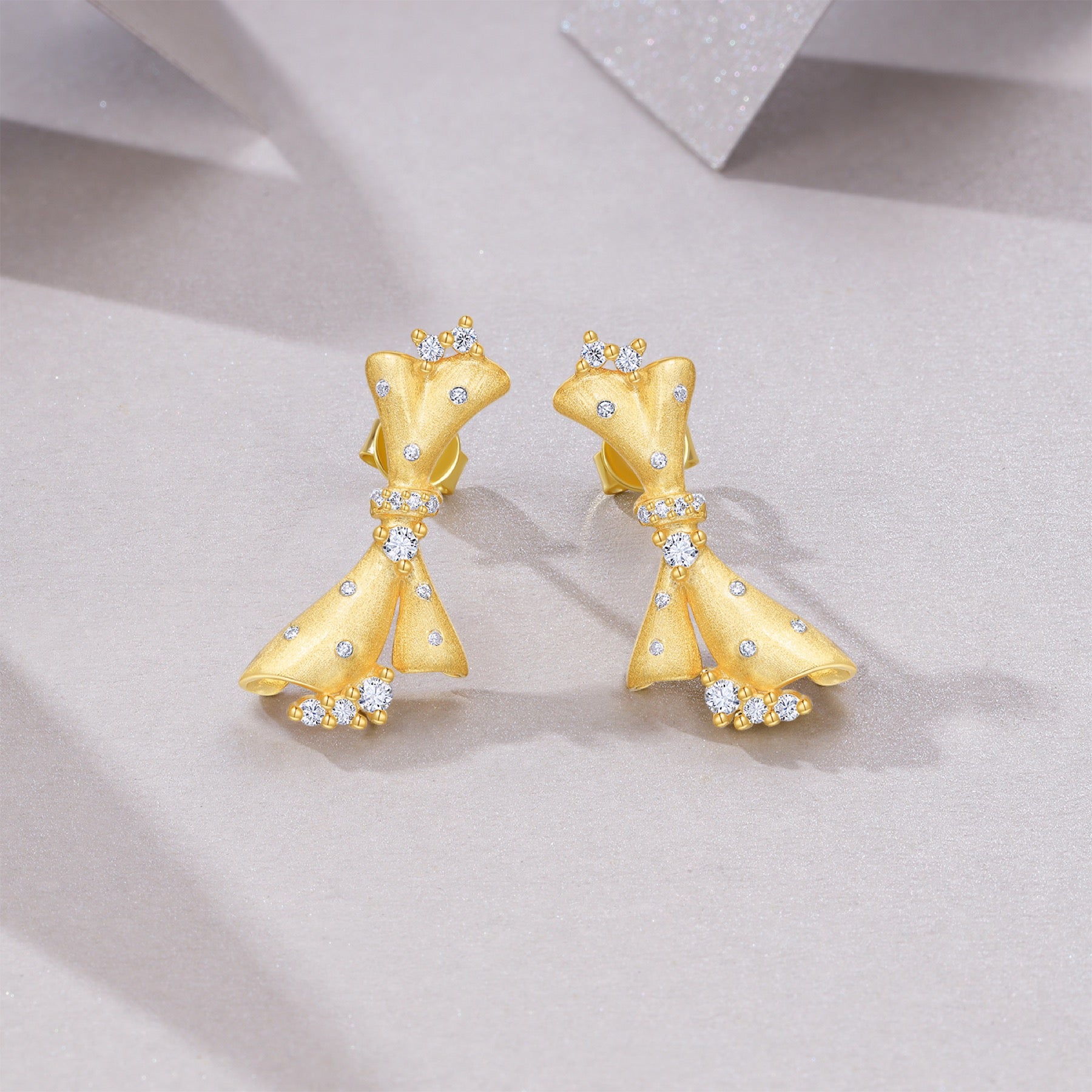 Cravatta Moissanite Bow Stud Earrings in Gold-Tone Sterling Silver