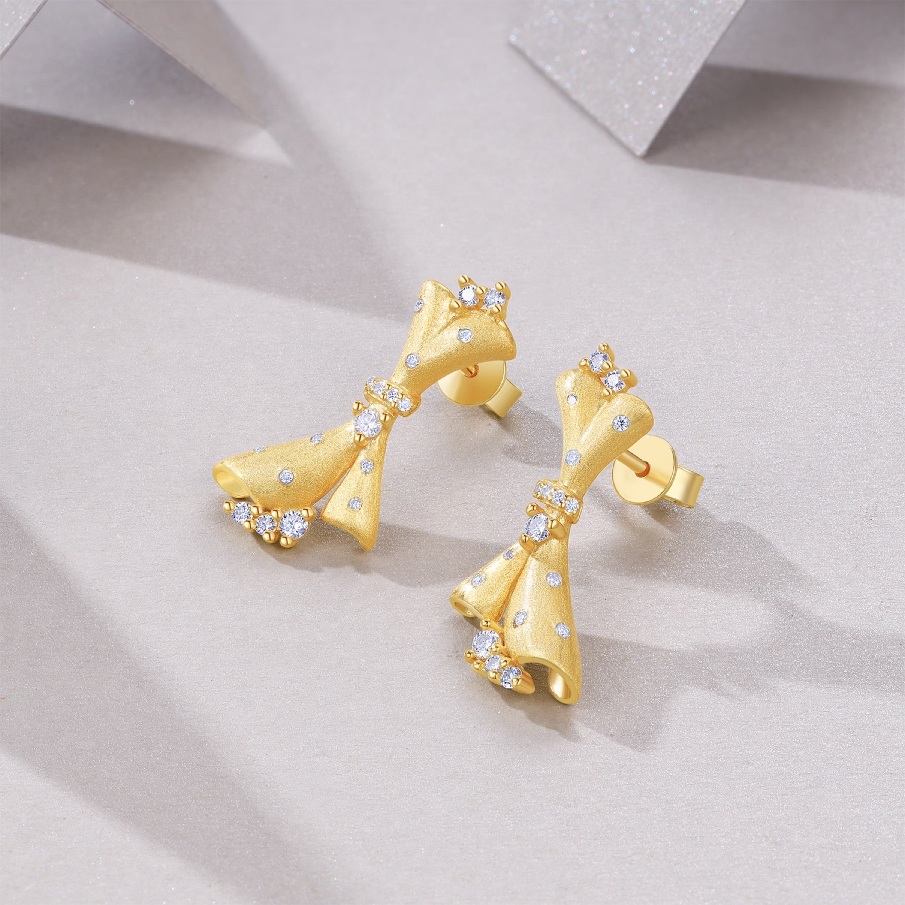 Cravatta Moissanite Bow Stud Earrings in Gold-Tone Sterling Silver