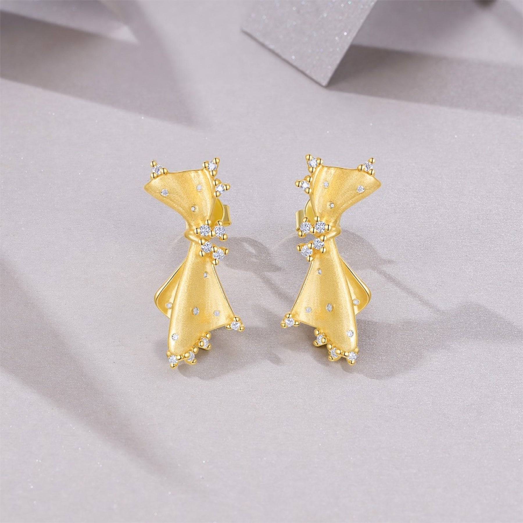 Nodo Moissanite Bow Stud Earrings in Gold-Tone Sterling Silver