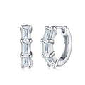 Tris Moissanite Huggie Hoop Earrings in Sterling Silver