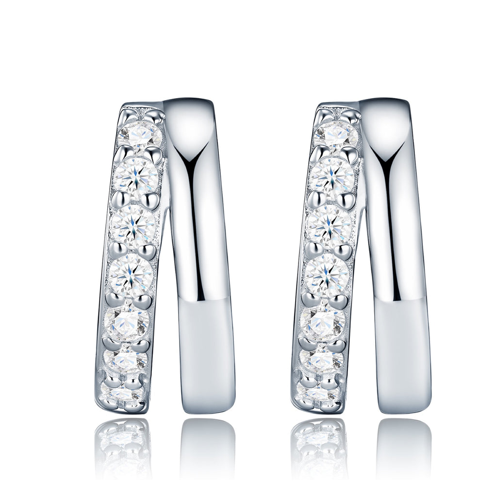 Larghezza Moissanite Huggie Hoop Earrings in Sterling Silver