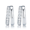 Larghezza Moissanite Huggie Hoop Earrings in Sterling Silver