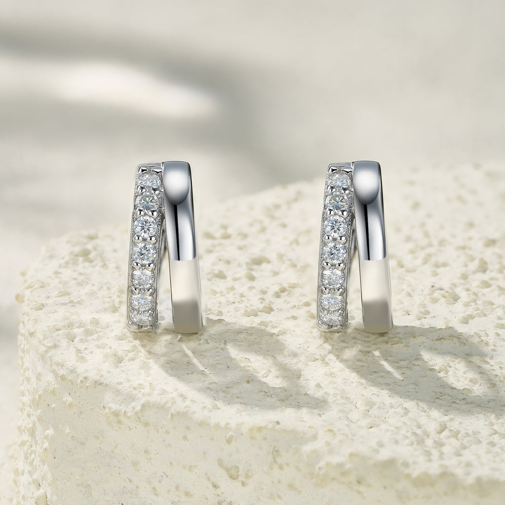 Larghezza Moissanite Huggie Hoop Earrings in Sterling Silver