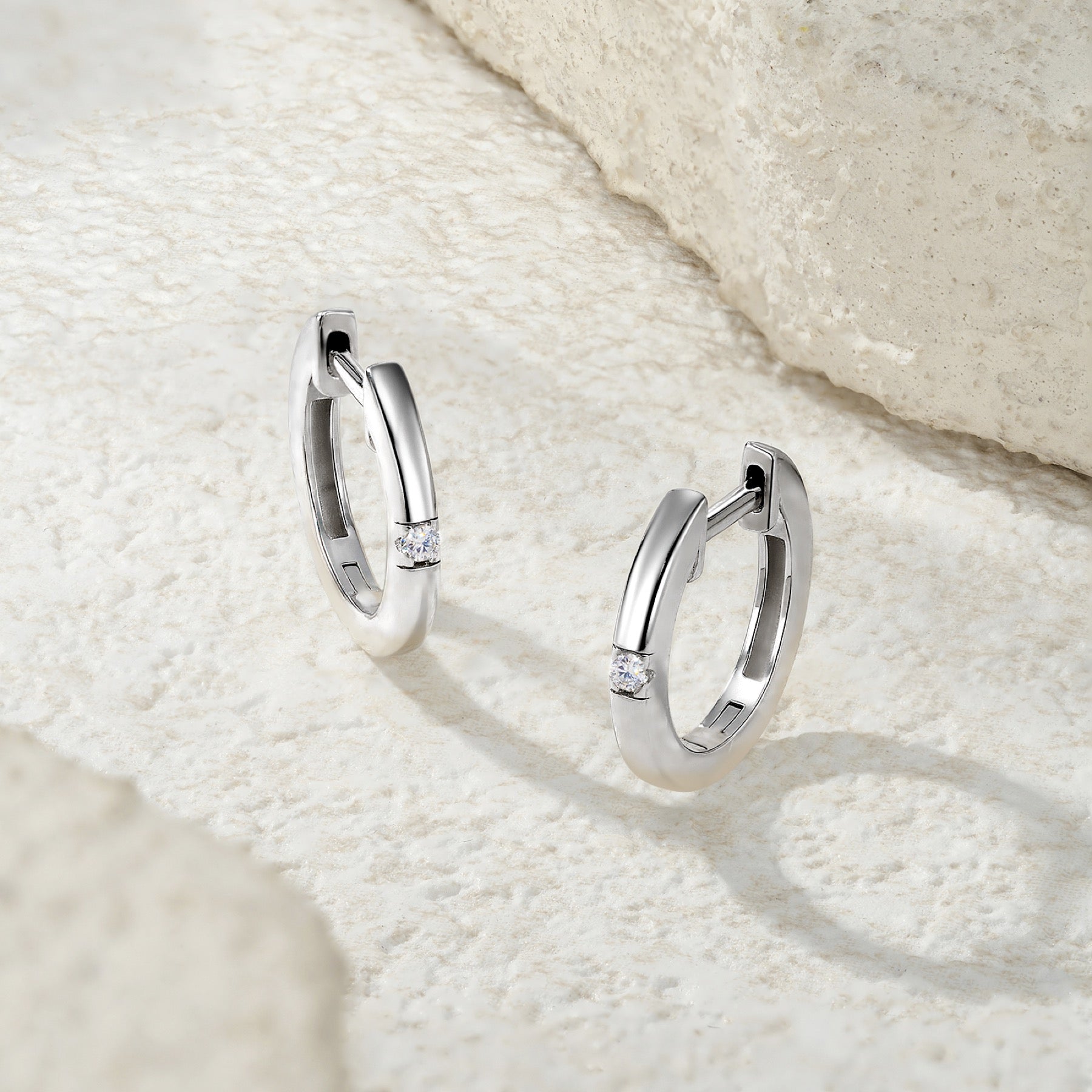 Semplice Moissanite Huggie Hoop Earrings in Sterling Silver