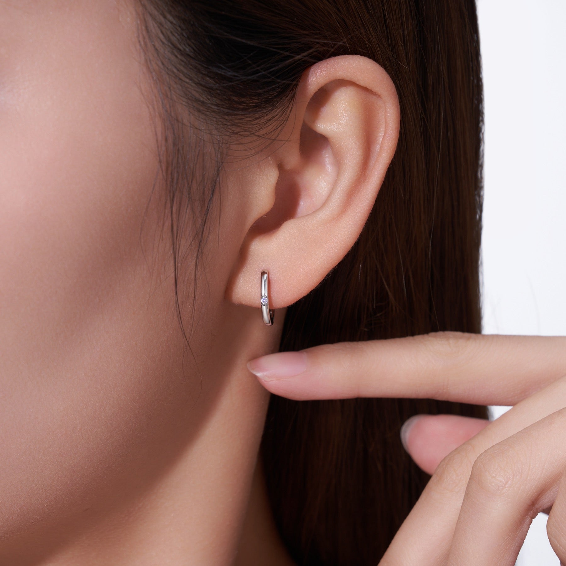 Semplice Moissanite Huggie Hoop Earrings in Sterling Silver