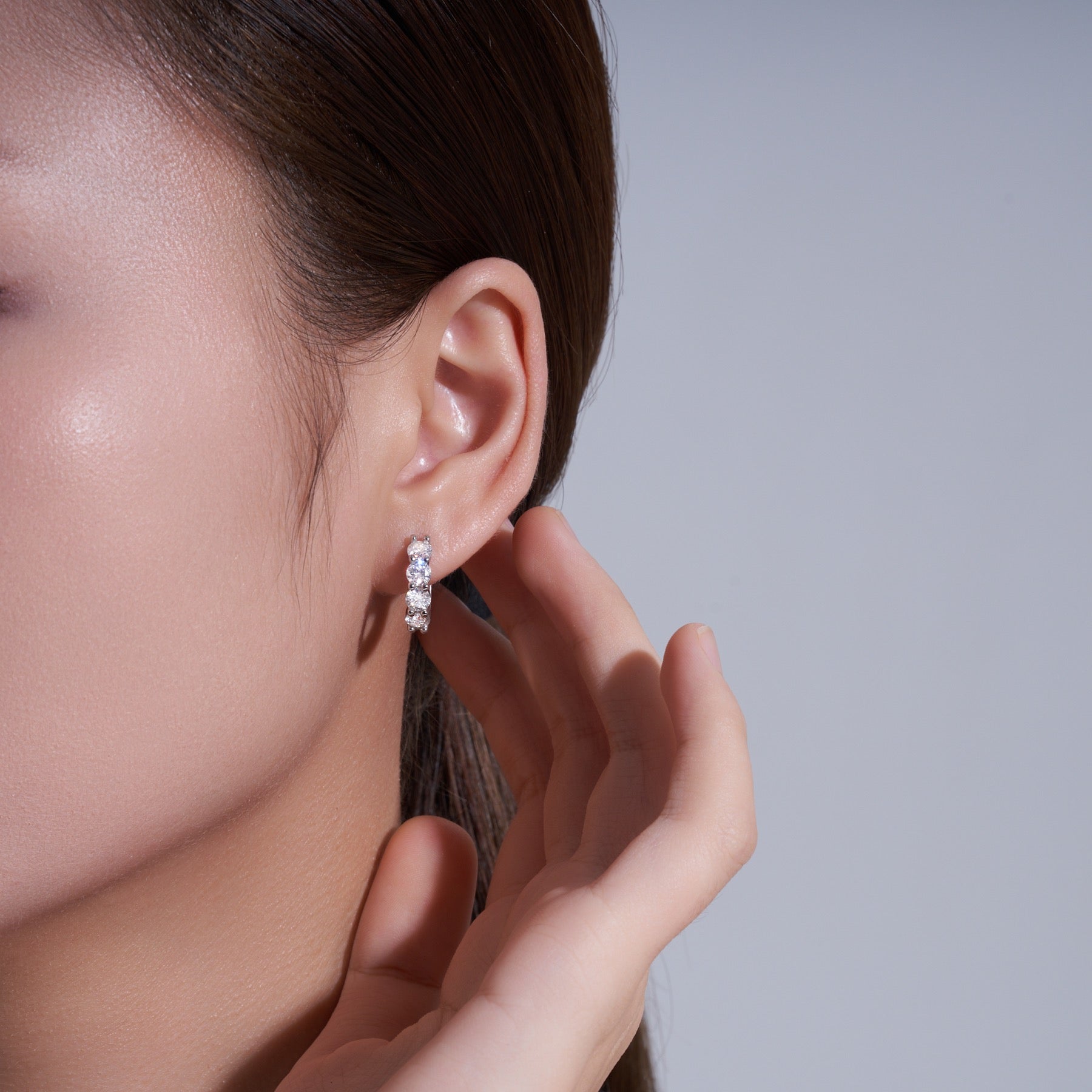Perlage Moissanite Huggie Hoop Earrings in Sterling Silver