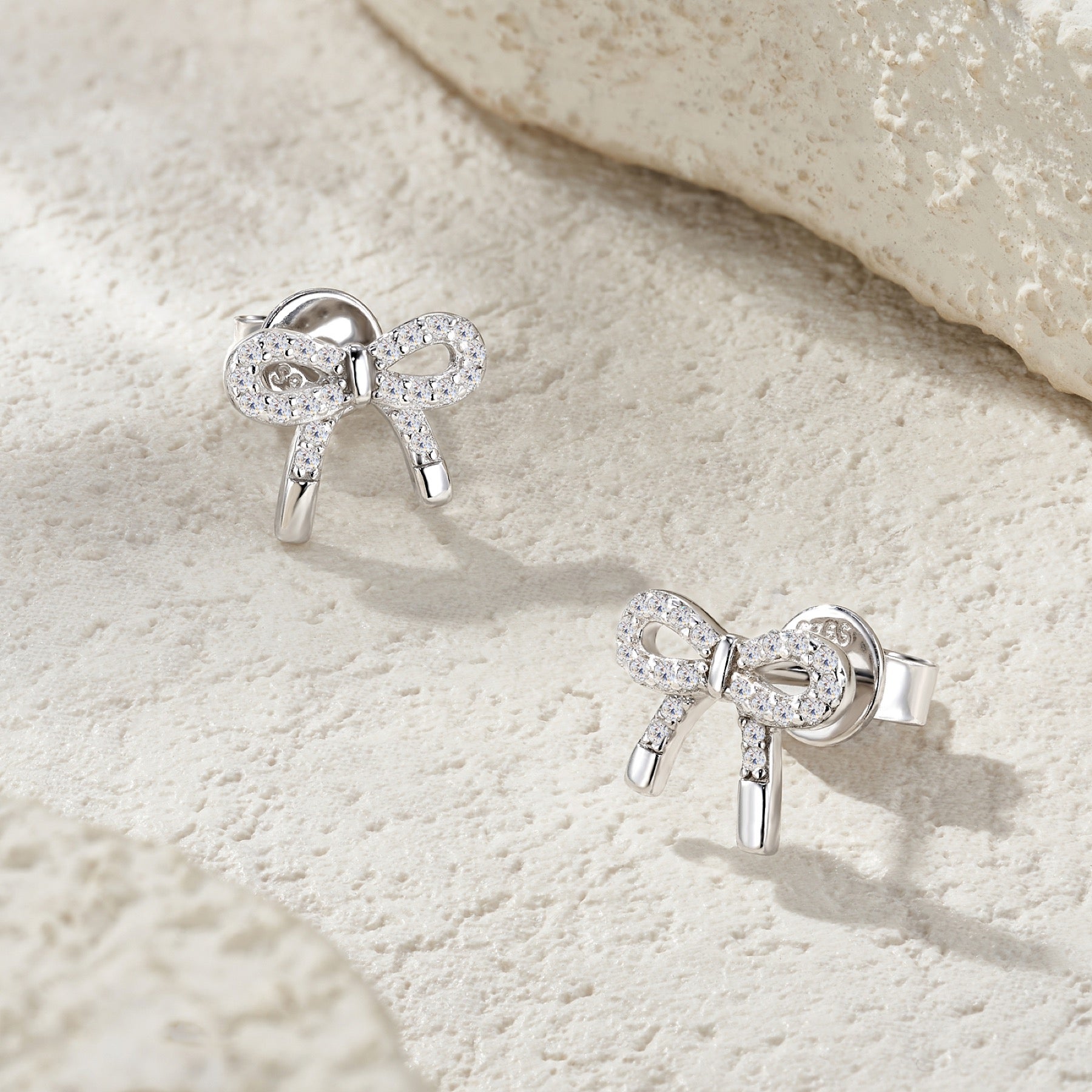 Fioccobag Moissanite Bow Stud Earrings in Sterling Silver