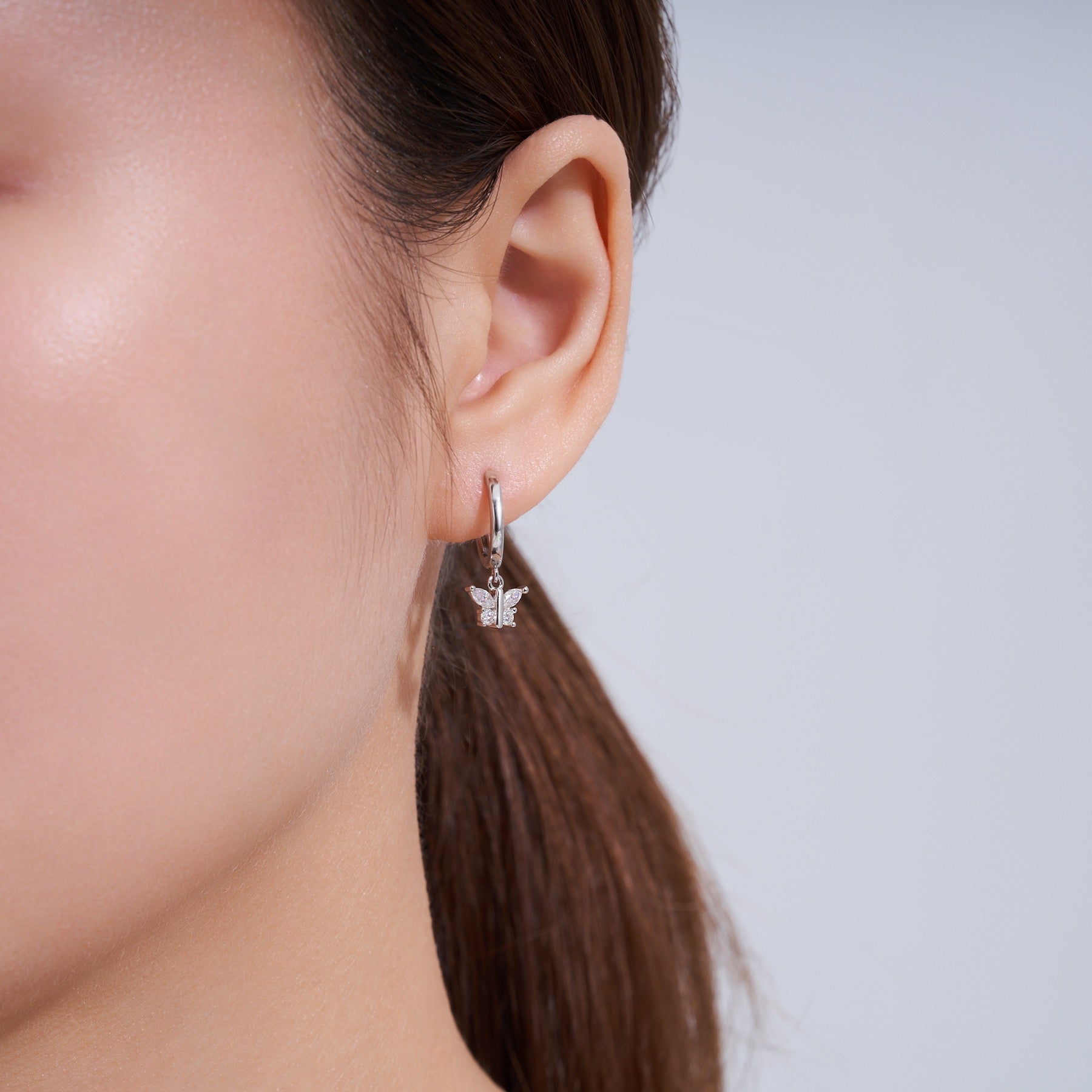Larga Moissanite Huggie Hoop Earrings in Sterling Silver