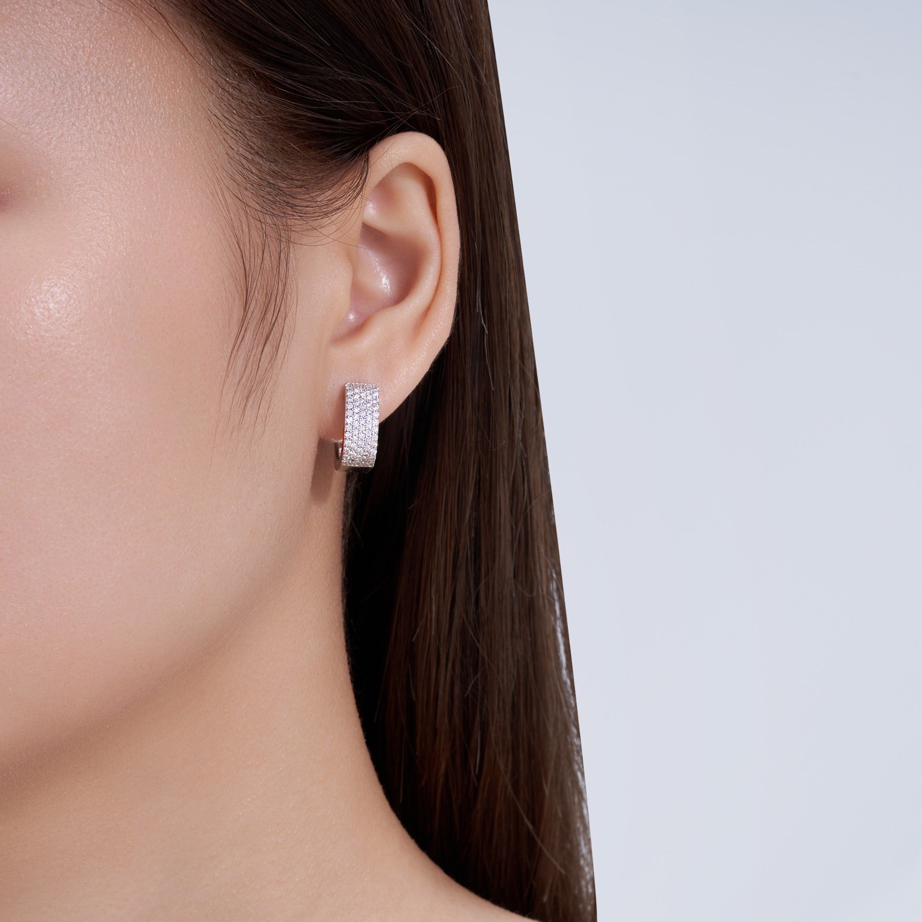 Fasciona Moissanite Huggie Hoop Earrings in Sterling Silver