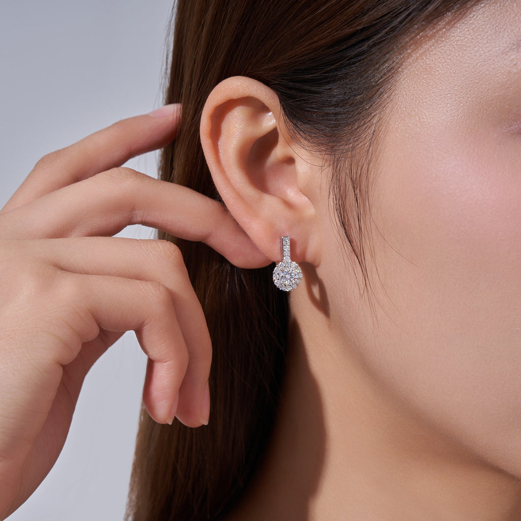 Aloe Moissanite Halo Drop Earrings in Sterling Silver, shown worn