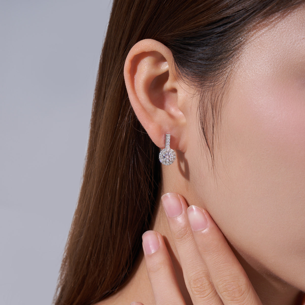 Aloe Moissanite Halo Drop Earrings in Sterling Silver, shown worn