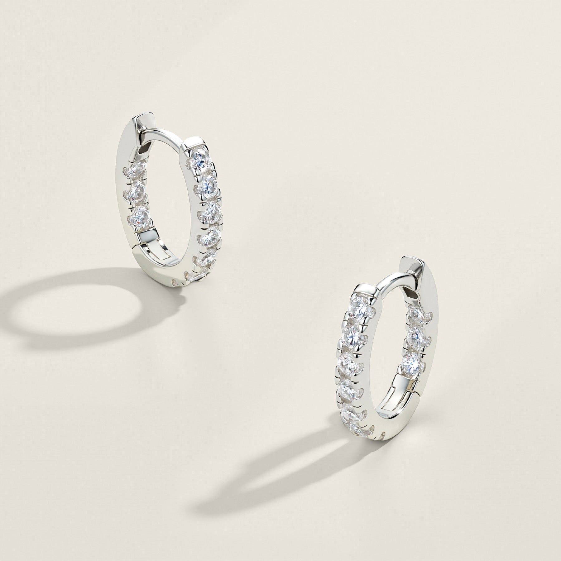 Puntina Moissanite Huggie Hoop Earrings in Sterling Silver