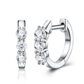 Terzina Moissanite Huggie Hoop Earrings in Sterling Silver