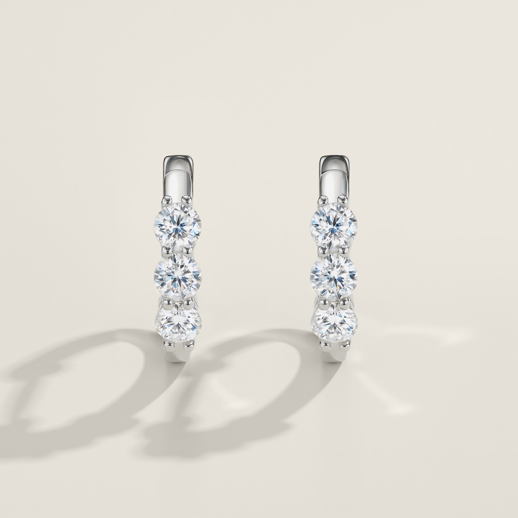 Terzina Moissanite Huggie Hoop Earrings in Sterling Silver