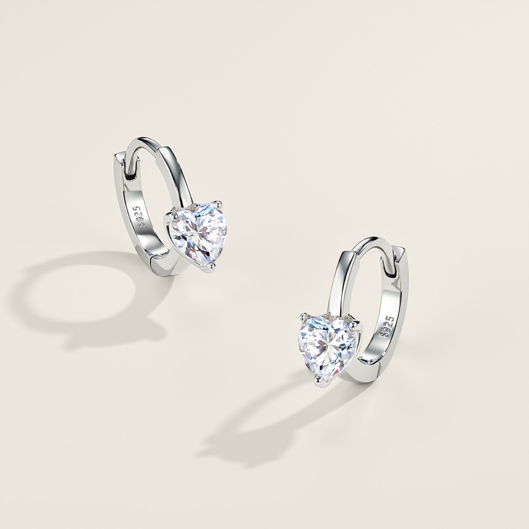Cuoretondo Moissanite Stud Earrings in Sterling Silver