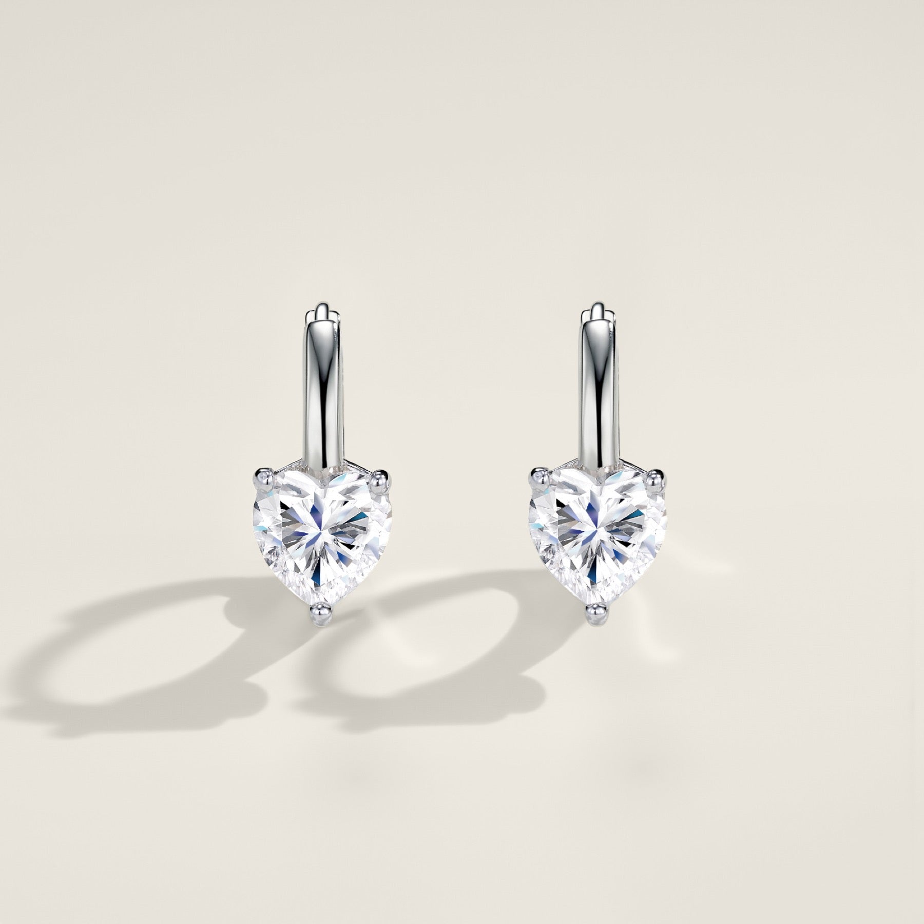 Cuoretondo Moissanite Stud Earrings in Sterling Silver