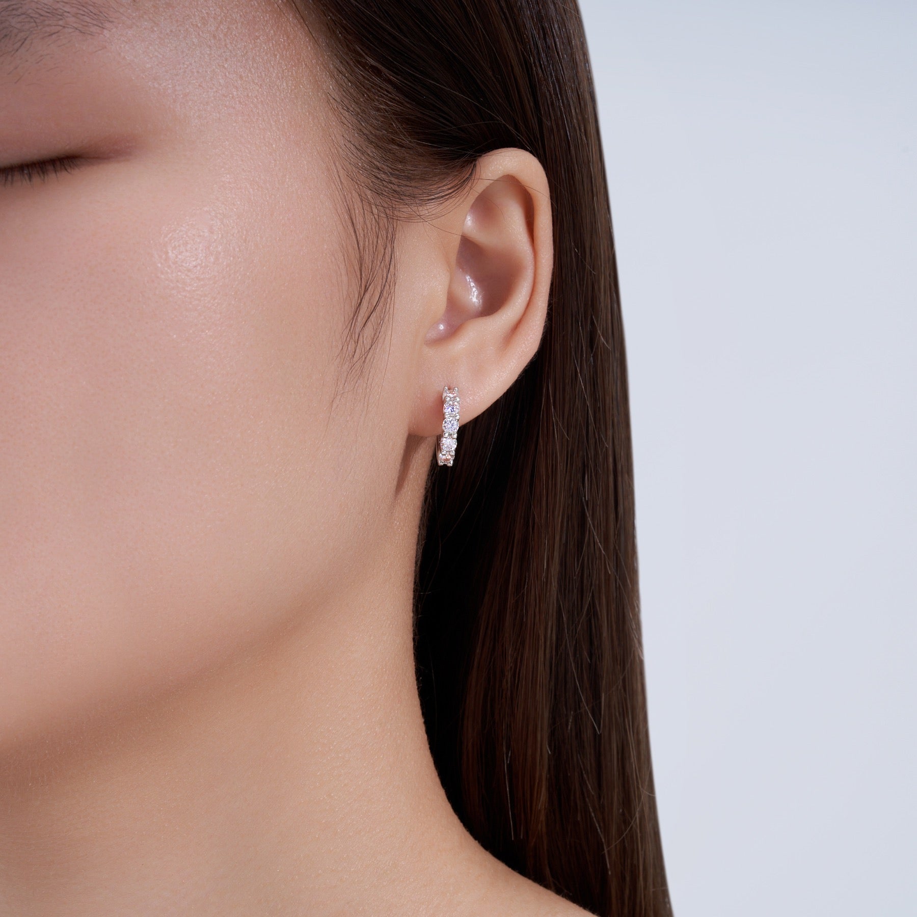 Scalare Moissanite Huggie Hoop Earrings in Sterling Silver