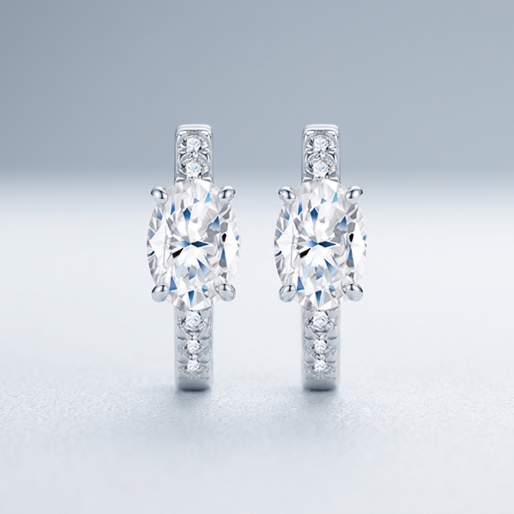 Cuscinato Moissanite Huggie Hoop Earrings in Sterling Silver