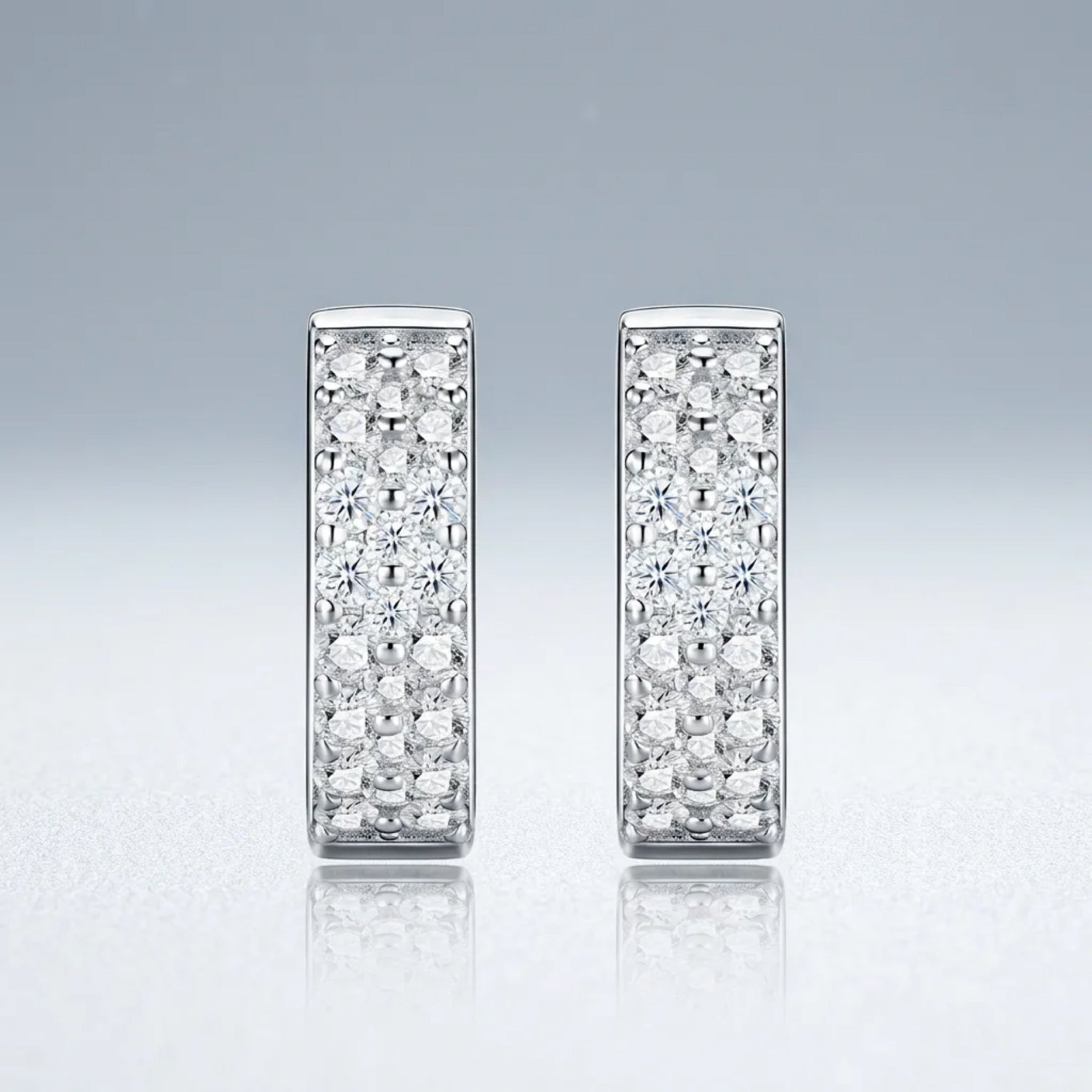 Fasciata Moissanite Huggie Hoop Earrings in Sterling Silver