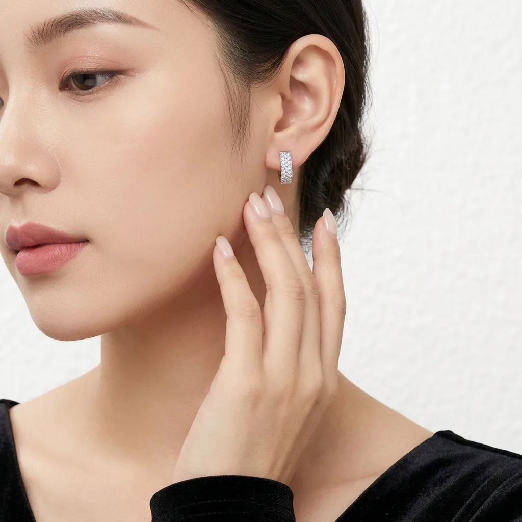 Fasciata Moissanite Huggie Hoop Earrings in Sterling Silver