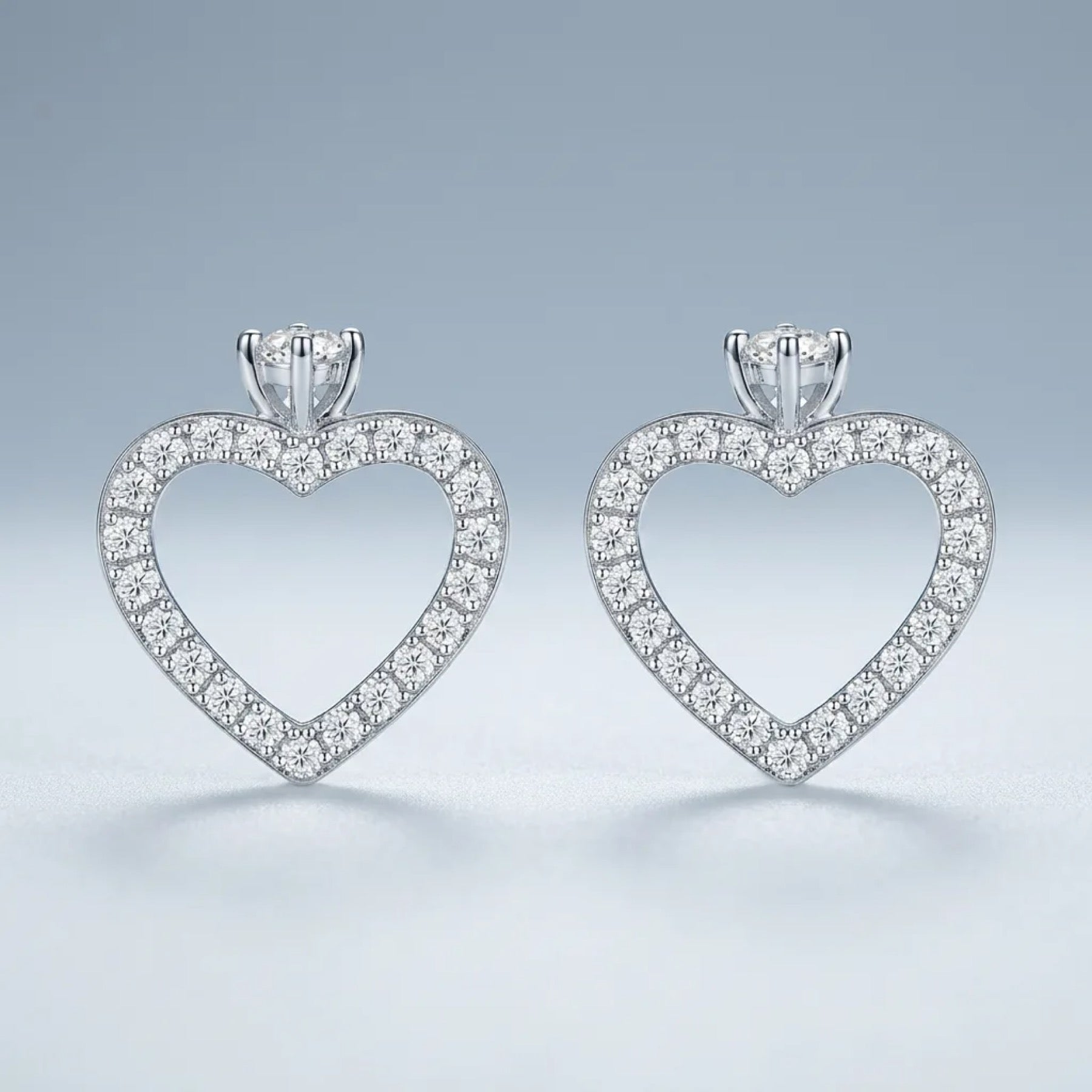Cuorolino Moissanite Heart Stud Earrings in Sterling Silver
