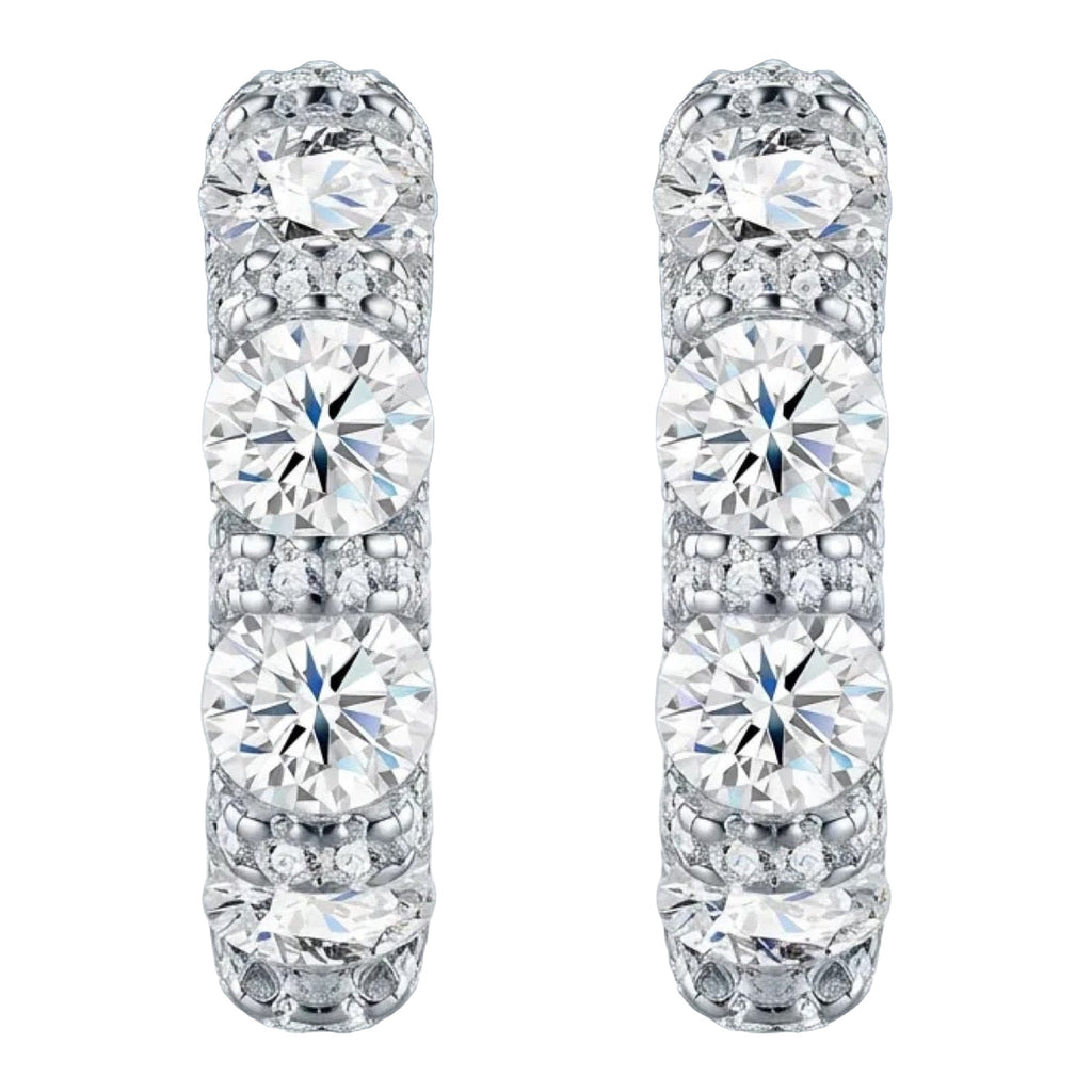 Alternino Moissanite Huggie Hoop Earrings in Sterling Silver, product photo on white background