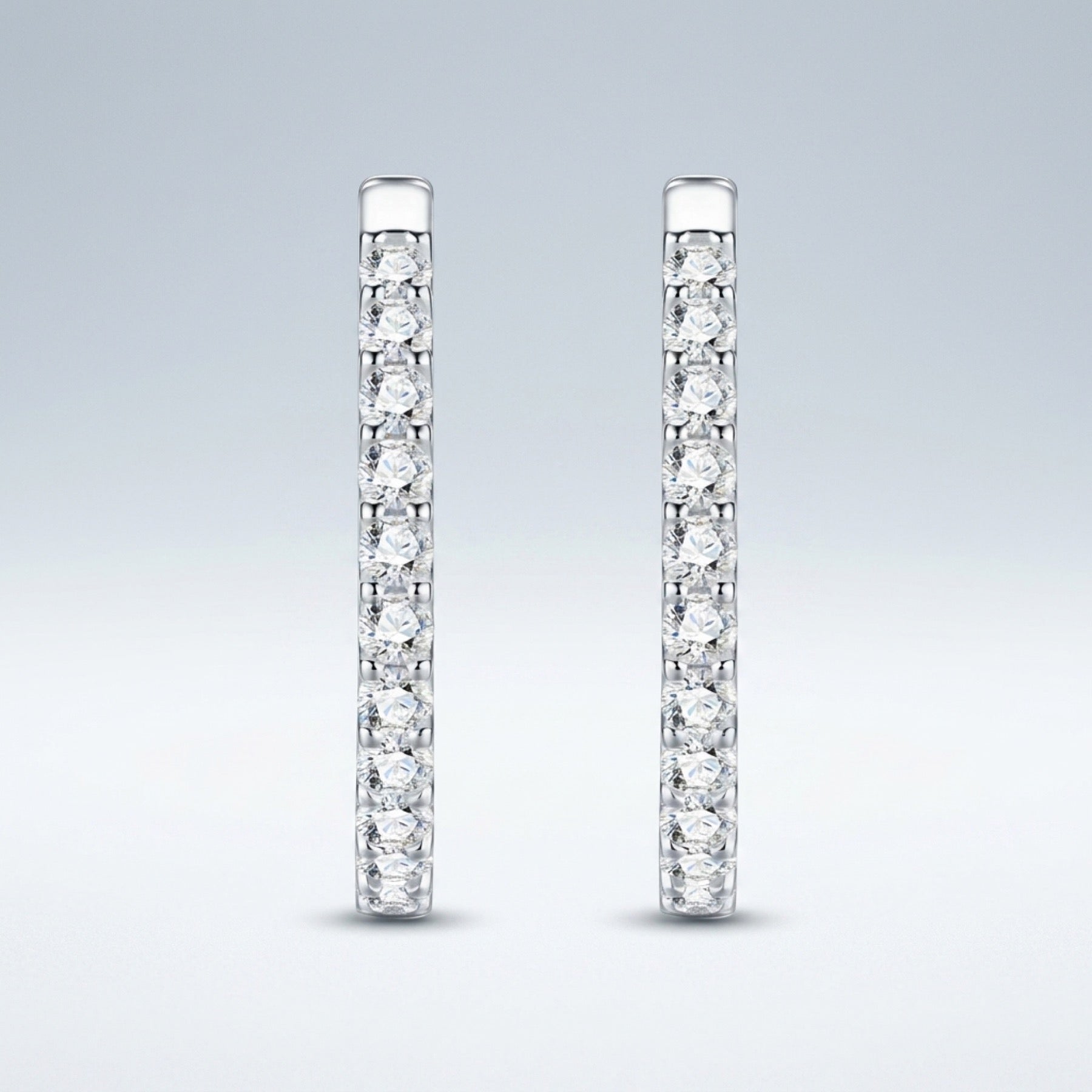 Ovalina Moissanite Huggie Hoop Earrings in Sterling Silver