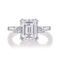 Token Emerald-Cut Moissanite Three-Stone Ring in Sterling Silver