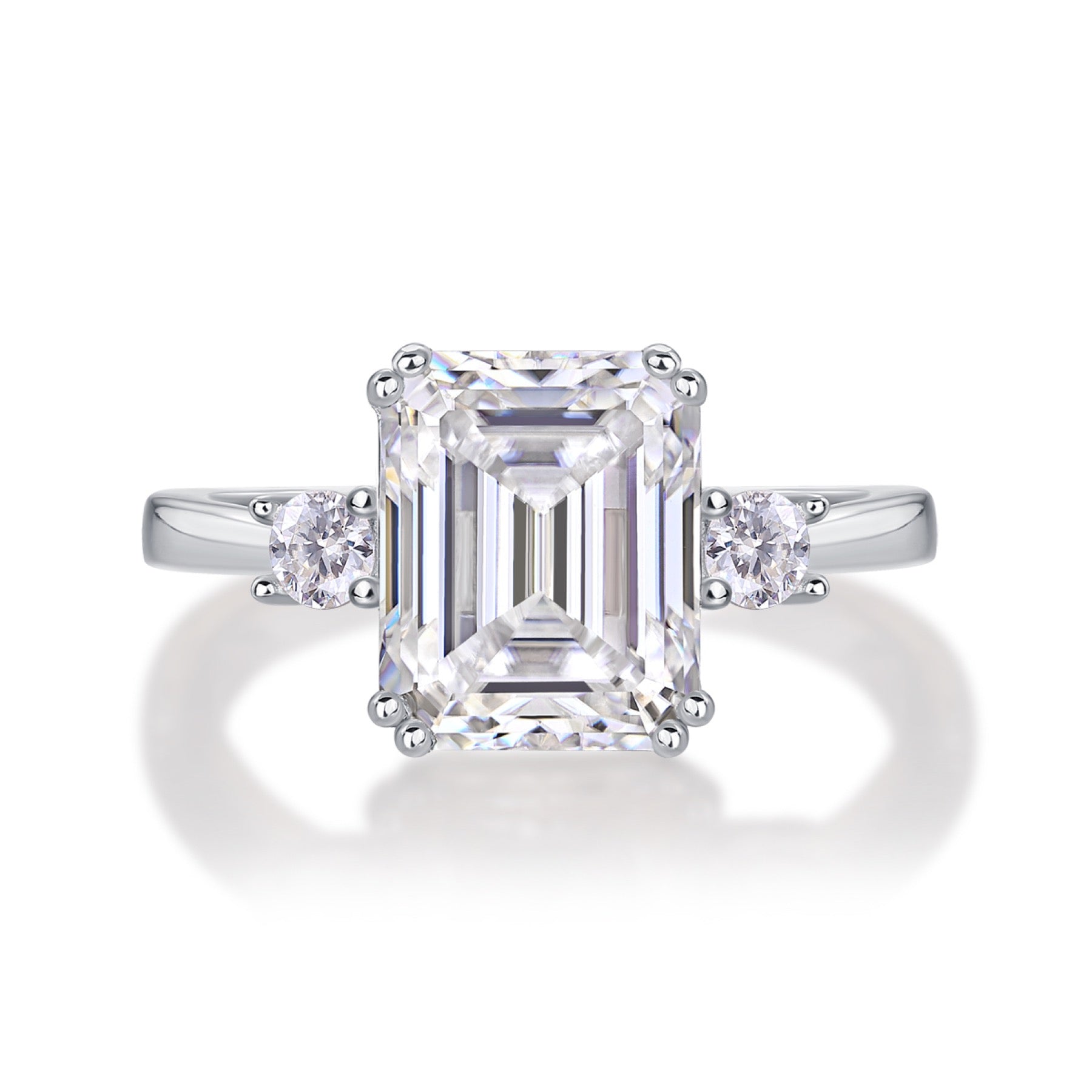 Token Emerald-Cut Moissanite Three-Stone Ring in Sterling Silver