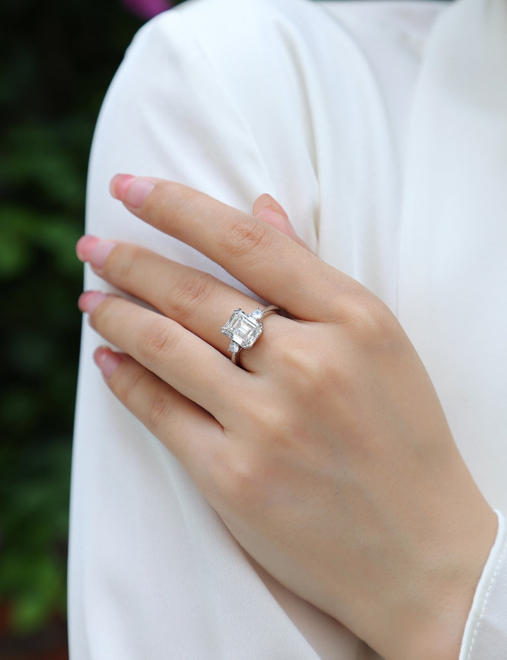 Token Emerald-Cut Moissanite Three-Stone Ring in Sterling Silver