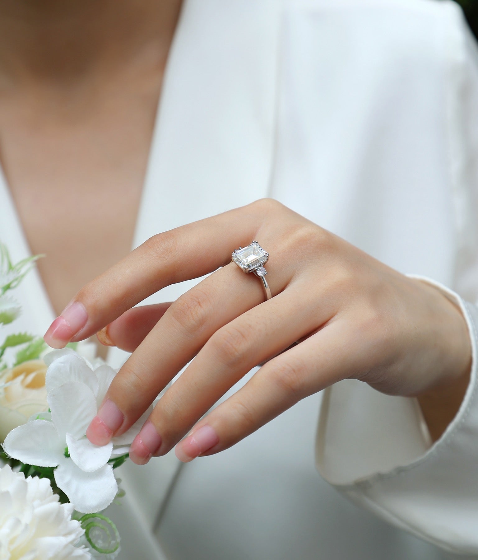 Token Emerald-Cut Moissanite Three-Stone Ring in Sterling Silver