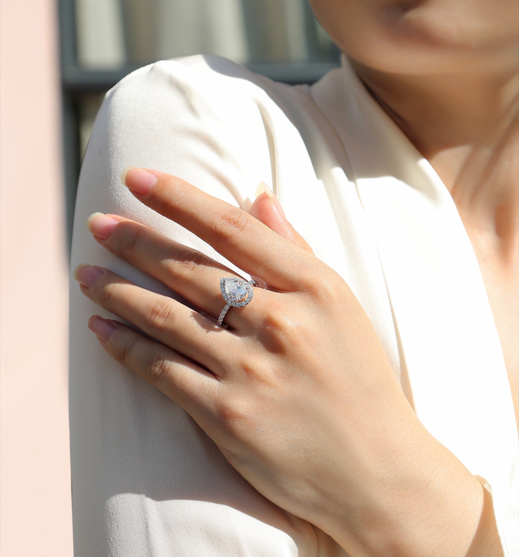 Spark Pear-Cut Moissanite Halo Ring in Sterling Silver