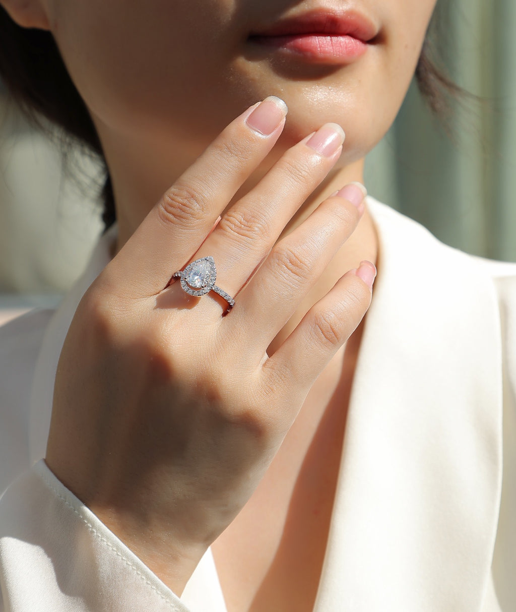 Spark Pear-Cut Moissanite Halo Ring in Sterling Silver