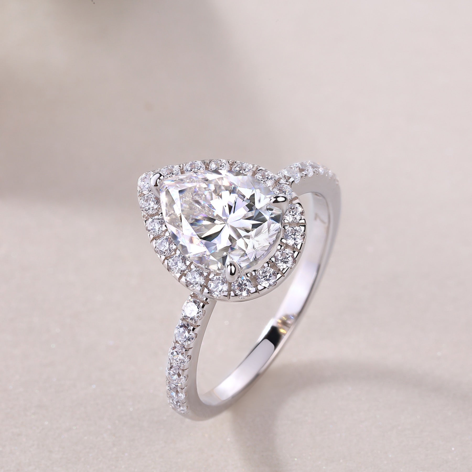 Spark Pear-Cut Moissanite Halo Ring in Sterling Silver