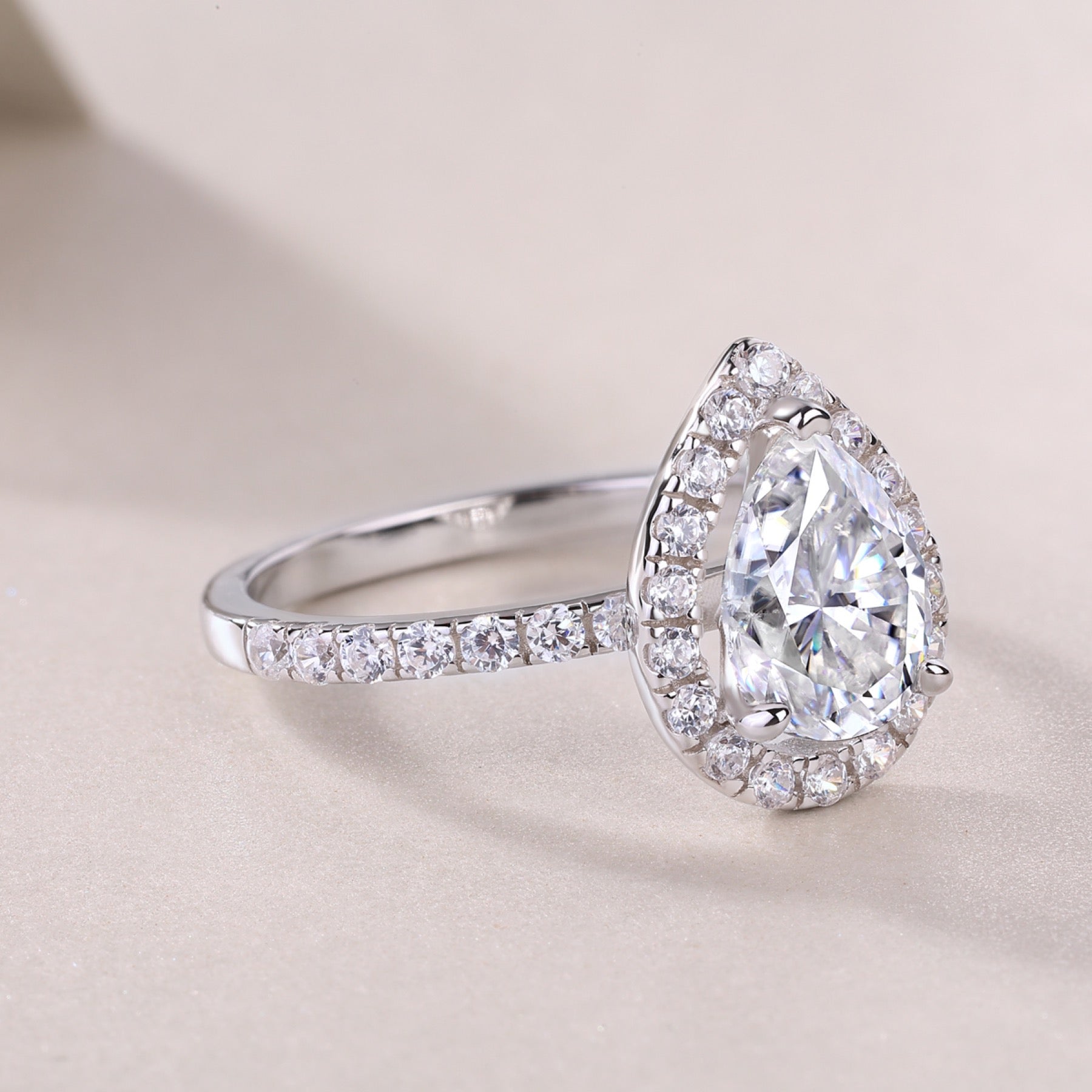 Spark Pear-Cut Moissanite Halo Ring in Sterling Silver