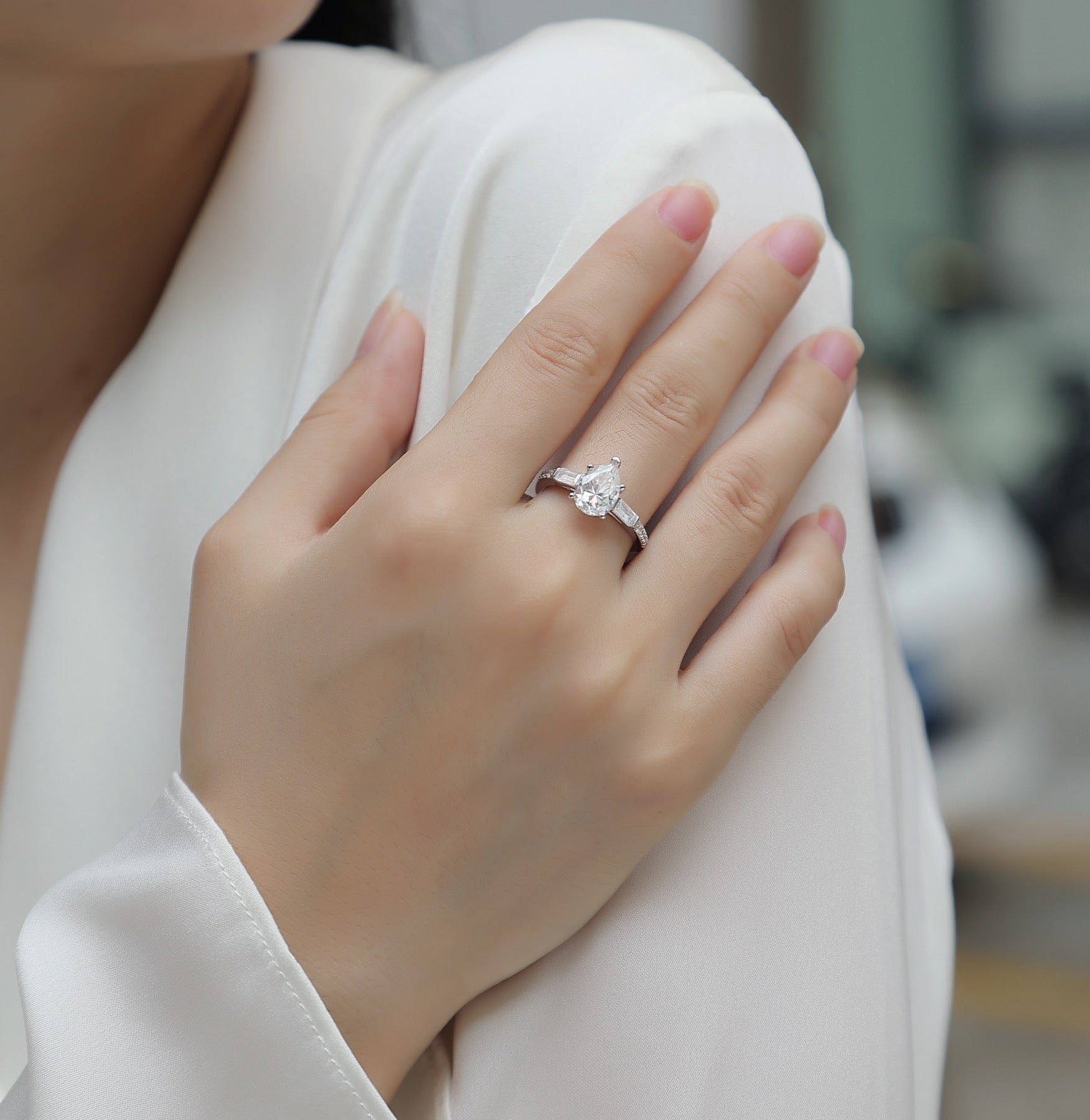 Moonlight Pear-Cut Moissanite Three-Stone Ring in Sterling Silver
